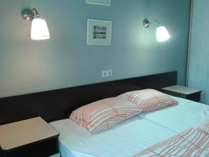 Кровать или кровати в номере Apartments Milena