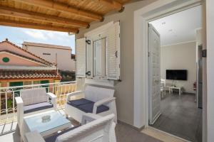Televízia a/alebo spoločenská miestnosť v ubytovaní Demargia Villa C - Loft Apartment in Zakynthos Town