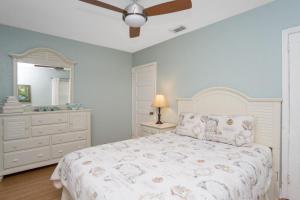 Letto o letti in una camera di Beach Place Guesthouses