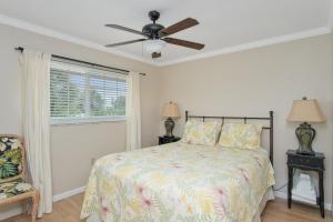 Letto o letti in una camera di Beach Place Guesthouses