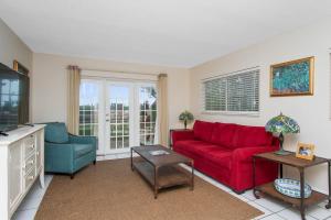 Area soggiorno di Beach Place Guesthouses