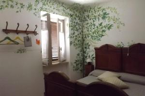 A bed or beds in a room at Poderi Sartoris
