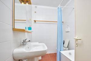 Koupelna v ubytování Appartamento Via dei Lecci + 15 fotografií