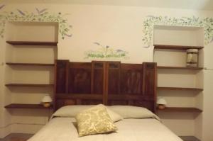 A bed or beds in a room at Poderi Sartoris