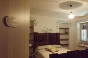 A bed or beds in a room at Poderi Sartoris Még 37 kép