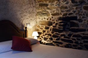 Posteľ alebo postele v izbe v ubytovaní Casa Rural Xiromo