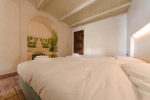 Posteľ alebo postele v izbe v ubytovaní JOIVY Apt on the Coast of Portofino with Lovely View