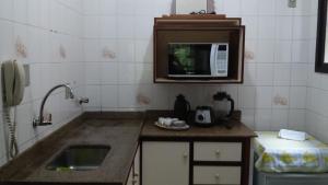 Køkken eller tekøkken på Apartamento Beira Mar