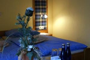 Postel nebo postele na pokoji v ubytování Wolffhotel + 7 fotografií