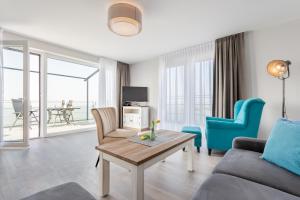 TV a/nebo společenská místnost v ubytování Seegarten Appartements Büsum
