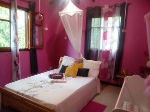 Postel nebo postele na pokoji v ubytování Villa Grand Case