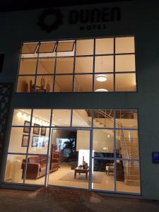 a store front with a large glass window at Dunen Hotel in Piranhas