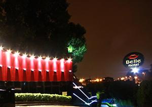 a building with lights on it with a bale sign at Motel Belle (Adult Only) in São Paulo