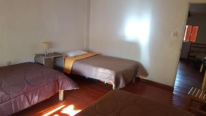 Letto o letti in una camera di Killari B&B