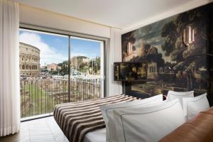 Postel nebo postele na pokoji v ubytování Hotel Palazzo Manfredi – Small Luxury Hotels of the World