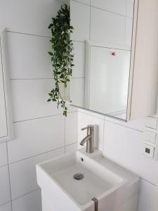 Kylpyhuone majoituspaikassa Skuteviken Apartments 40