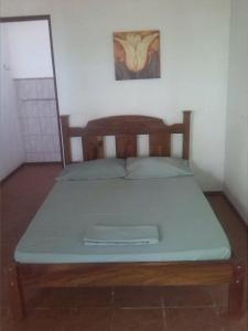 Letto o letti in una camera di Tiquisia Lodge