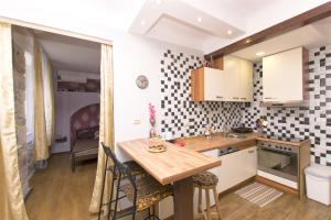 Kuchyň nebo kuchyňský kout v ubytování Apartment Nikolina