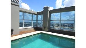 Casa con piscina y vistas a la ciudad en Amazing Apartament en Buenos Aires