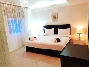 Postel nebo postele na pokoji v ubytování KB Apartments Karon Beach by PHR