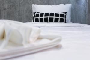 Letto o letti in una camera di The Simple Koh Yao Noi