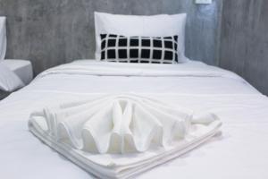 Letto o letti in una camera di The Simple Koh Yao Noi