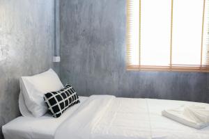 Letto o letti in una camera di The Simple Koh Yao Noi
