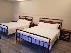 Postel nebo postele na pokoji v ubytování Hotel Kristal