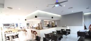 A restaurant or other place to eat at 2 bed apartment on Condado De Alhama with roof solarium N5