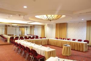 The business area and/or conference room at The Bellezza Hotel Suites
