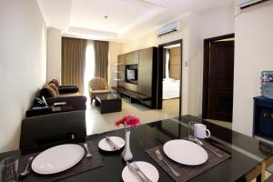 A seating area at The Bellezza Hotel Suites