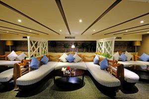 A seating area at The Bellezza Hotel Suites