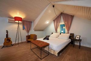 Postel nebo postele na pokoji v ubytování Bubalus Boutique Rooms