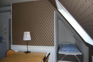 Katil atau katil-katil dalam bilik di Halmstad Hotell & Vandrarhem Kaptenshamn