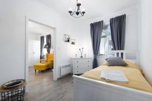 Postel nebo postele na pokoji v ubytování Hotel Pošta