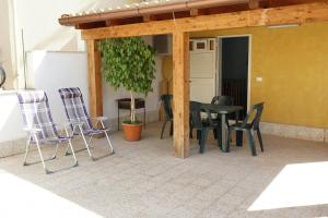 Patio lub wspólna przestrzeń na świeżym powietrzu w obiekcie Casa Vacanza il Ciliegio
