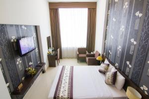 TV a/nebo společenská místnost v ubytování Ngoc Linh Luxury Hotel