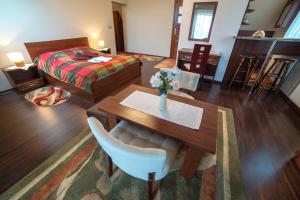 Łóżko lub łóżka w pokoju w obiekcie Janówka Apartamenty