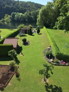 an aerial view of a garden with a pond at Ferienwohnung Hankel in Hemfurth-Edersee