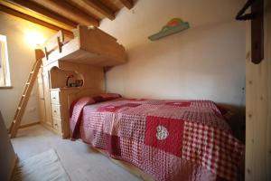 Ein Bett oder Betten in einem Zimmer der Unterkunft Albergo Diffuso Valcellina e Val Vajont in Casso