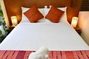 Letto o letti in una camera di Mojo Lodge Hakuba