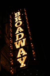 a neon sign for the ritz radio station at Millennium Hotel Broadway Times Square in New York