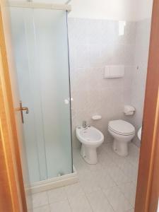Koupelna v ubytování Camere Carloni + 18 fotografií