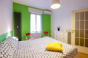 Krevet ili kreveti u jedinici u objektu The Best Rent - Tortona Apartment