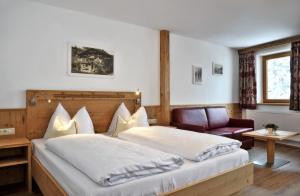Katil atau katil-katil dalam bilik di Bed & Breakfast Hotel Märzenklamm