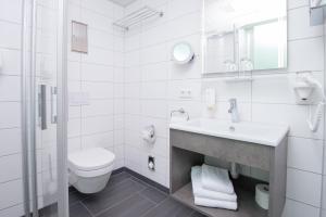 Ein Badezimmer in der Unterkunft Stadthotel Freiburg Kolping Hotels & Resorts