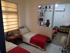Katil atau katil-katil dalam bilik di Jilufugan B&B