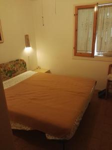 Villaggio Moresco Altoにあるベッド