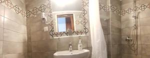 Kúpeľňa v ubytovaní Erofili Rooms