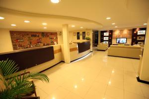 a lobby of a hospital with a waiting room at San Manuel Praia Hotel in Aracaju +23 photos